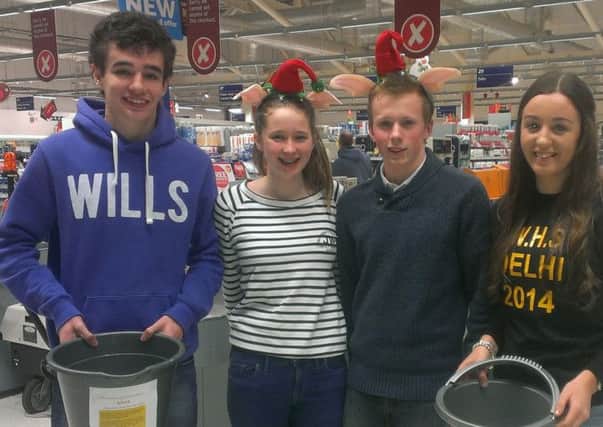 Asha team member Emma Morrow pictured with other volunteers from Wallace High School on a recent bag pack.