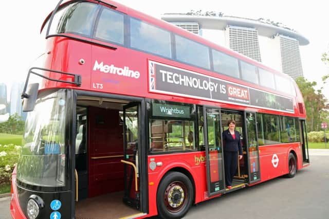 Enterprise Minister Arlene Foster is pictured on board the Wrightbus-built 'Great' bus in Singapore. The bus is currently on a world tour as part of the 'Great' Britain and Northern Ireland marketing campaign.