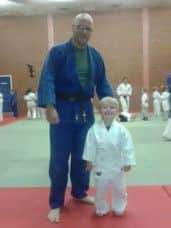 Philip Barnett pictured with his little boy Charlie, who is follows in his dad's footsteps.