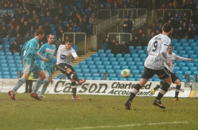 David McDaid applies the clinical finish to put Coleraine ahead at Ballymena Showgrounds. Picture:  Derek Simpson