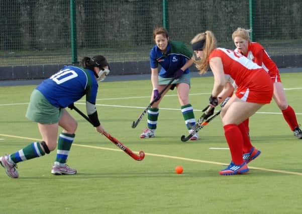 Action from Larne Ladies 2nd XI and Grosvenor 2nd XI. INLT 08-005-PSB