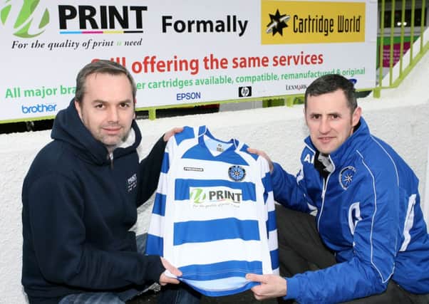 Peter Hendron of U Print (formally Cartridge World) presents a sponsored kit to Ali McGarry for the North End United Youth Under 8 team. INBT08-222AC