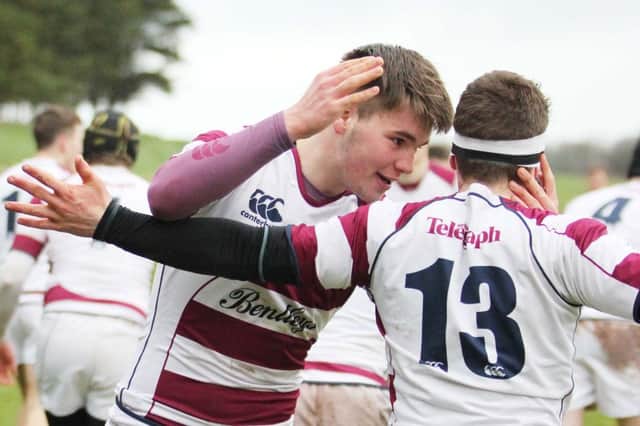 CAI try scorer Mark Gordon gets the plaudits after scoring against Regent House. PICTURE MARK JAMIESON.