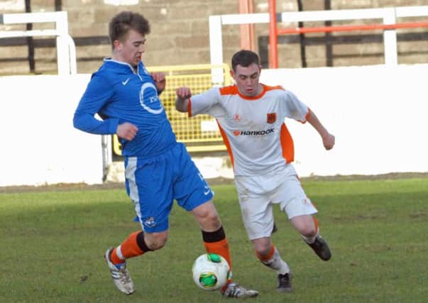 Jody Lynch in action for Carrick Rangers in their game against Loughgall at Inver Park. Photo: Phillip Byrne