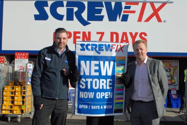 Andrew Livingston (right), CEO of Screwfix, is pictured with Mark Henderson, branch manager, at the official opening of the new Screwfix store at Longwood Road, Newtownabbey. INNT08-001-PSB