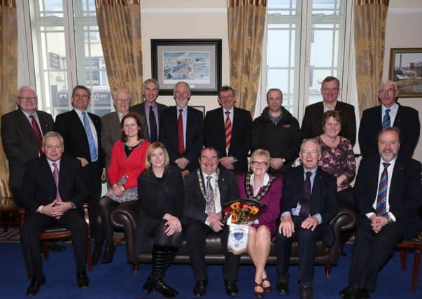 Members of Ballymena Rotary Club who were guests of the Mayor Cllr Audrey Wales at a reception in the Mayor's Parlour last week where Acting President Steve Hall presented Cllr Wales with a bouquet of flowers. Ballymena Rotary this year celebrate their 75th anniversary. INBT 08-105JC