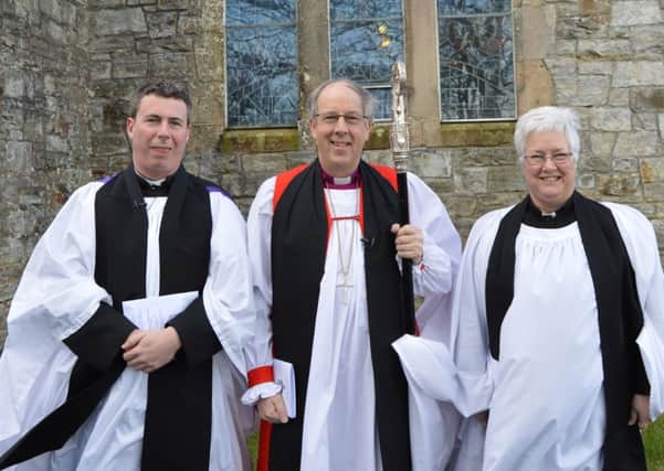 Rev David McDonnell, Bishop Good and Dean Katherine Poulton pictured at the installation service.