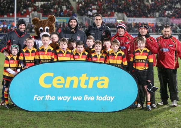 Strabane U11 team pictured with Ulster rugby players Paddy Wallace, Adam Macklin, David McIlwaine and masco Sparky.