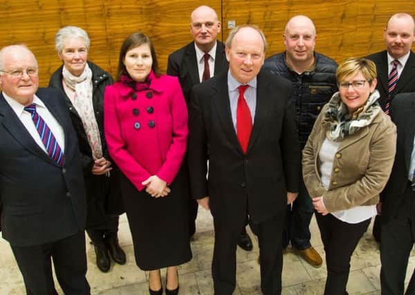 STANDING. TUV Leader, Jim Allistair, pictured with candidates for the upcoming Causeway Coast and Glens elections. They are, Cllr William Blair, Cllr Boyd Douglas, Howard Gordon. Elizabeth Collins, Mrs Jamise McIlhagga, Cllr Sharon McKillop, Thomas Sterling and Tommy Collins.CR8-109SC.