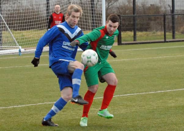 Action from Larne Tech OB against Newington Rangers at The Cliff. Photo: Phillip Byrne