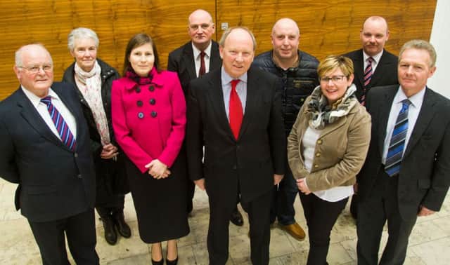 STANDING. TUV Leader, Jim Allistair, pictured with candidates for the upcoming Causeway Coast and Glens elections. They are, Cllr William Blair, Cllr Boyd Douglas, Howard Gordon. Elizabeth Collins, Mrs Jamise McIlhagga, Cllr Sharon McKillop, Thomas Sterling and Tommy Collins.CR8-109SC.