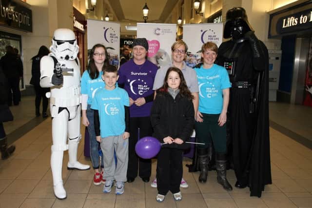 Billie Young, Calvin Young, Diane Young, Lisa Kirkwood, Abbie Kirkwood and Joan Turner with the help of Darth Vader and his storm trooper promoting the Ballymena Relay for Life raising money for Cancer Research. INBT08-278AC