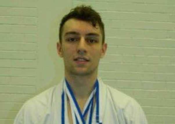 Andrew Mills scooped three medals in Munich. INBM08-14F