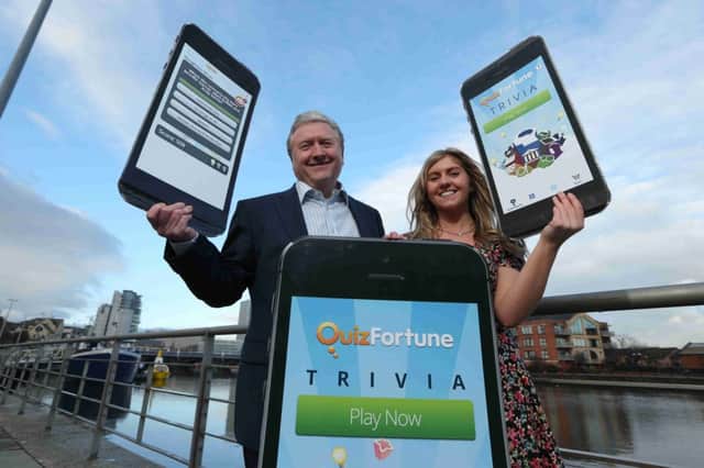 Local man, Vincent Rainey and his daughter Rebekah have launched the first mobile quiz app to come out of Northern Ireland.inbm09-14