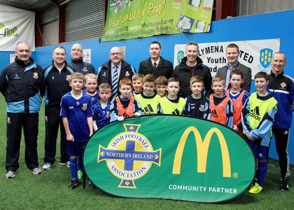 Photographed in the Sport's Hut, Cullybackey on Saturday morning with the Ballymena United Youth Academy lads and officals was Ian Paisley (Jr) MLA. INBT 08-805H