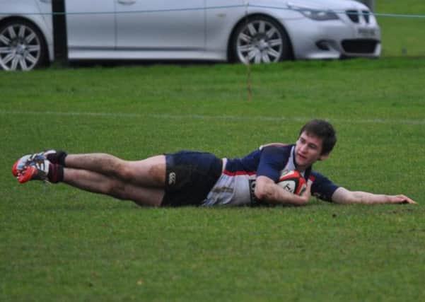 Andrew Magrath touches down for a try in Ballymena Academy's Subsidiary Shield win over Belfast High School.