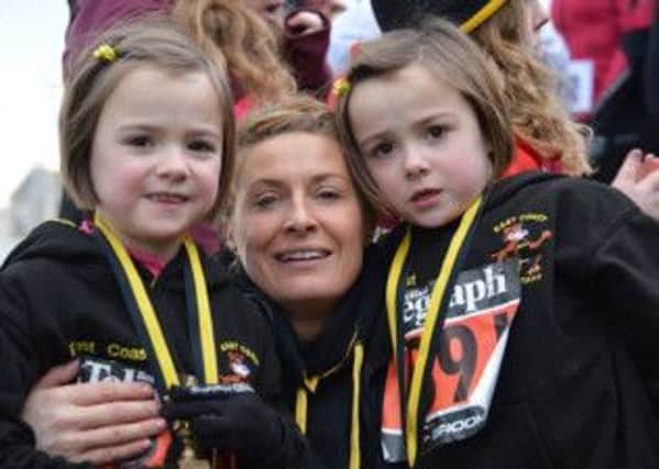 Roisin Lavery with daughters Abbie and Evie at the East Coast AC Club championship races