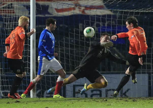 Glenavon's Kyle Neill failed to make this chance count against Linfield.