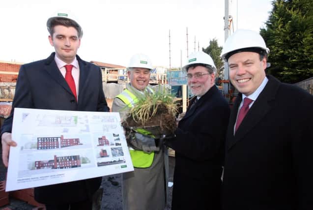 Councillor Phillip Brett, Steve Amos, Chairman of Clanmil Housing, Nelson McCausland MLA and Nigel Dodds MP cutting the first sod on the new social housing development at Antrim Road, Glengormley. INNT 09-014-FP