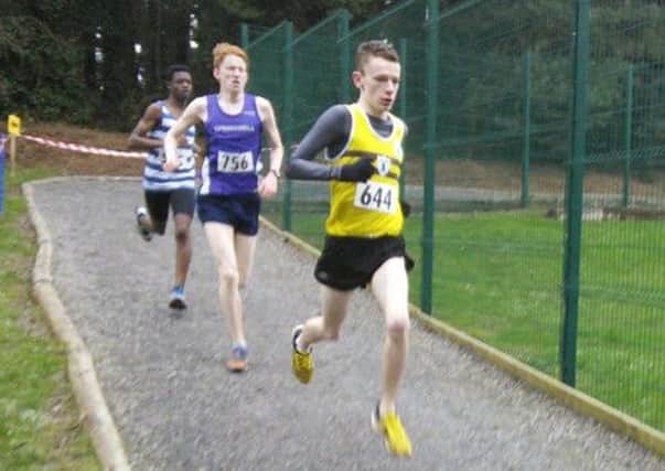 Fit N Running athlete Connor McQuillan (yellow vest) in action at Stormont.