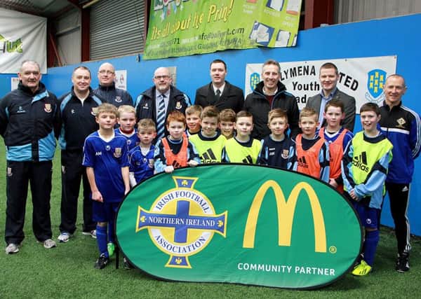 Photographed in the Sport's Hut, Cullybackey on Saturday morning with the Ballymena United Youth Academy lads and officals was Ian Paisley (Jr) MLA. INBT 08-805H