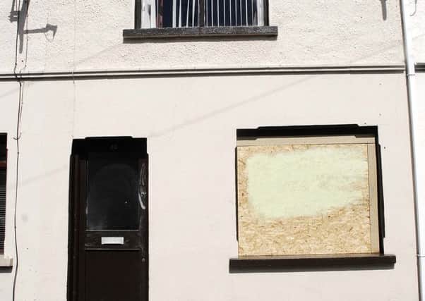 Broken window at a house in Albert St, Lurgan. INLM20-213.