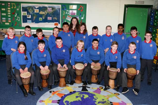 The Ballymena PS djembe drummers who were awarded a distinction for their performance at the Ballymena Festival. The group also recently performed at the Raise the Roof concert. Included is teacher Gillian Andrews. INBT10-231AC
