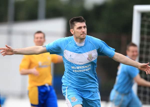 David Munster celebrates after opening the scoring for Ballymena United in today's Irish Cup quarter-final against Dungannon Swifts. Picture: Press Eye.
