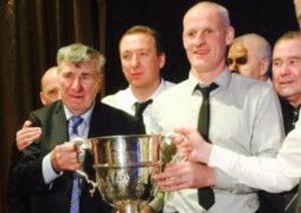 Former Derry City manager Jim McLaughlin along with treble winners Liam Coyle and Paul Hegarty.