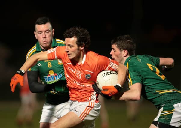 Allianz Football League Division 2, Pairc Tailteann, Navan, Co. Meath 1/3/2014 
Meath vs Armagh
Meath's Andrew Tormey and Donal Keoghan with Jamie Clarke of Armagh
Mandatory Credit ©INPHO/Morgan Treacy