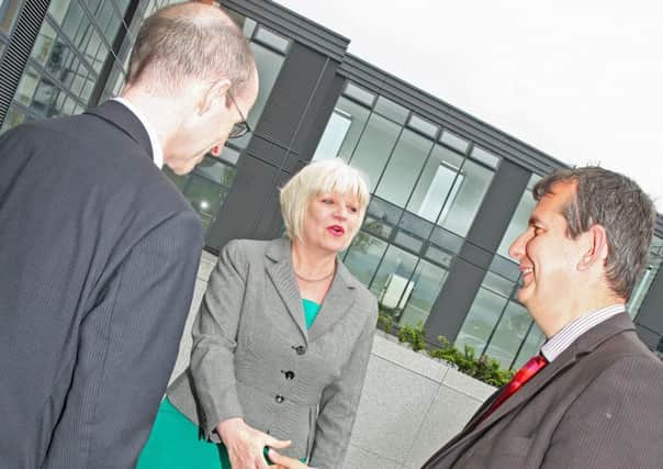 Health Minister Edwin Poots, MLA, at Altnagelvin Hospital with Gerard Guckian, chair, Western Trust and Elaine Way, Chief Executive, Western Trust.