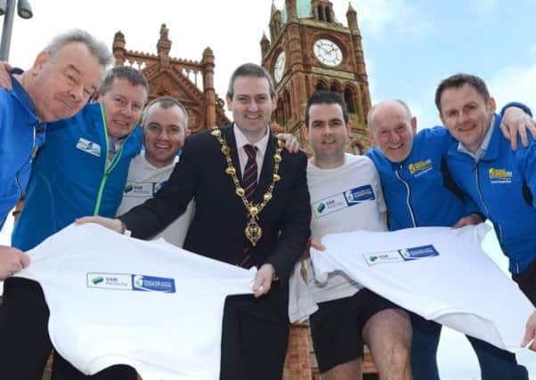 Organisers of the SSE Airtricity Walled City Marathon 2014 pictured with the Mayor Councillor Martin Reilly at the launch of the event in Guildhall Square included from left are Charlie Large, Noel McMonagle, Gareth King, Eglinton Road Runners, Donal Gormley, SSE Airtricity, Gerry Lynch and Scott Galbraith.