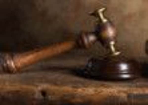 Judge's court wig and hammer or gavel