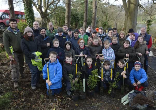 Primary 6 pupils from St. Oliver Plunkett Primary School, Strathfoyle, who helped members of the Conservation Volunteers to plant trees on the banks of Enagh Lough as part of the NGO Challenge Fund by the Enagh Youth Forum to tidy up the area. INLS0914-130KM