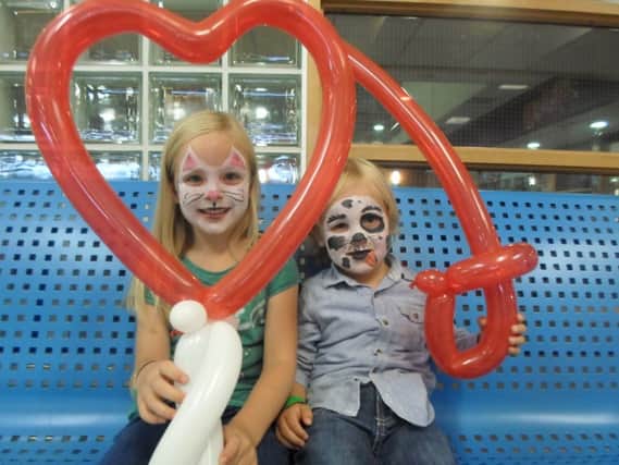 Lara and Luke Quinn enjoy the festivities and face painting at the Family Fun Day event held at Sixmile Leisure Centre, Ballyclare.