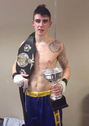 Brian Houston with the ISKA Commonwealth Middleweight title