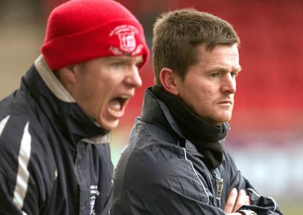 Ballyclare boss Eddie Hill (right) with assistant-manager, Gary Bell.