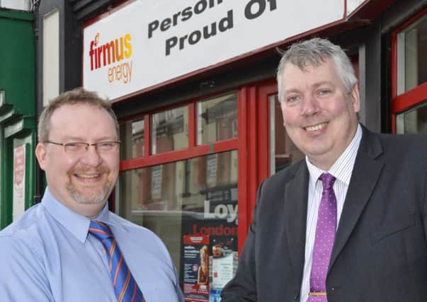 William Allen, right, Group Editor, pictured with Gavin Twamley, Domestic Sales Representative for Firmus Energy. INLS0814-166KM