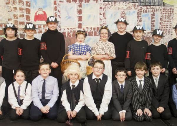 Pupils from Cumber Claudy Primary School who took part in a World War 2 project, dressed in period costume.