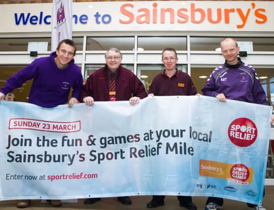 IT'S A RELIEF. Members from Springwell Running Club, launch this years Sport Relief Mile with Pat King and Dessie McAleese from Sainsburys on Saturday. This years event is to be held on the 23rd march.CR8-110SC.