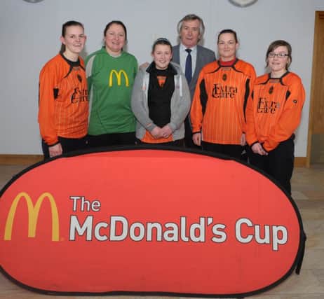 McDonalds Coleraine ladies staff pictured with Pat Jennings.