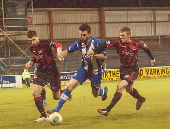 Paul Leeman and Matthew King all too aware of the threat posed by Coleraine's Eoin Bradley