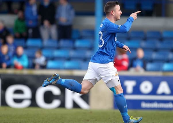 Glenavon's  Shane McCabe celebrates scoring the equaliser for 2-2 against Dungannon Swifts  during Saturday's  Danske Bank Premiership match at Mourneview Park. Picture by Brian Little/Presseye