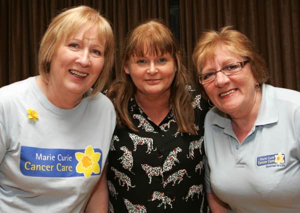 JUST FOR FUND. Marie Curie Fundraising committee Ballycastle members, Winnie McGarry, Natalie Dallas and Breige McGarry pictured during the Rio Salsa charity dance launch at the Lodge Hotel.CR11-112SC