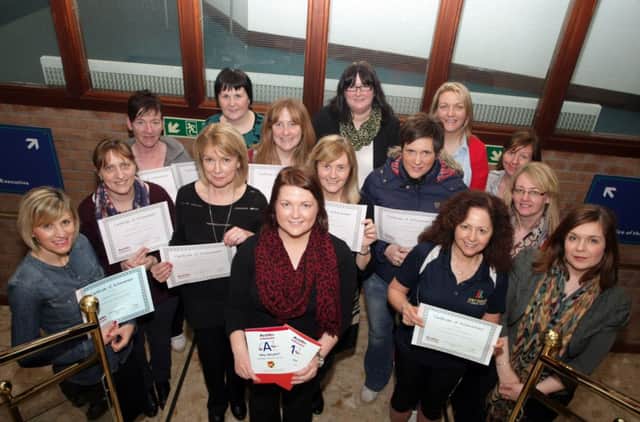 I WONDER. Lorraine Savage (front centre), Health Promotion Officer for Action Cancer, pictured on Thursday with Council staff who completed a 12 wk 'Wonder Women' course.INBM11-14 017SC.