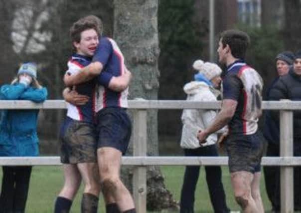Ballymena Academy's players celebrate after reaching the final of the Subsidiary Shield after beating Limavady Grammar.