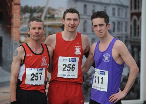Connor Bradley, centre, winner of the SSE Airtricity 10K at Ebrington. Also included, are Scott Rankin second, on right, and Declan Reed third on left.