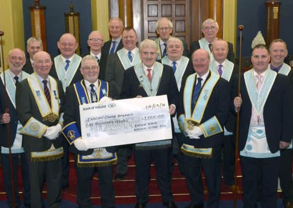 OVARIAN CANCER DONATION UNION BAND MASONIC LODGE 336, 
In 2013 members of Union Band Masonic Lodge 336, Banbridge attended a meeting of the Provincial Grand Lodge of Down held in Belfast. During this meeting Right Worshipful Brother Barry Brewster spoke to all of the Masons present. He described how his wife Denise had suffered Ovarian Cancer, and although she had fought hard against the disease her fight had ended. It was a truly emotional speech, and one which got the attention of the Worshipful Master, Senior Warden and Treasurer of Union Band Lodge, Banbridge. Barry Brewster explained that he felt he wanted to try and help those women, who were suffering from this horrible disease, furthermore he wanted too to help those conducting far reaching search into treatments and possible cures for this cancer. His idea was to have every member of the Masonic order in our province to donate £1 per month. At that time he was not aware of the response he was about to receive from the Masonic Order.
In November 2013