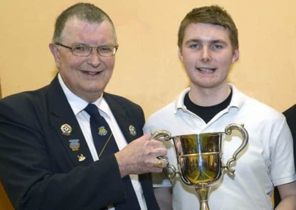 Zone Convenor Harold Massey presented the cup to Singles winner Michael Beattie (Dromore NS) included is Zone Chairman Finbar Polin © Edward Byrne Photography INBL10-224EB