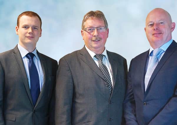 DUP MP Sammy Wilson with Coast Road candidates Gordon Lyons and Drew Niblock. INLT 11-606-CON